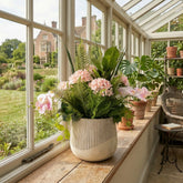 Amelia Artificial Planted Arrangement 82cm Pink Hydrangea, Orchid & Fern in Decorative Stone Effect Pot